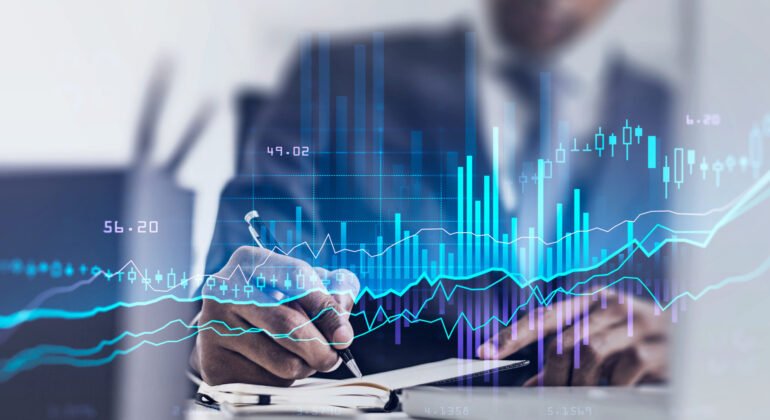 Man in office room, graph changes lines and bars with numbers