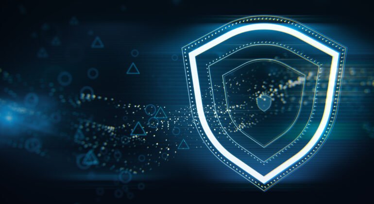 Creative wide perspective glowing shield hologram on blue wallpaper with various blurry icons. Cyber security, data protection concept. Modern wireframe design. 3D Rendering.