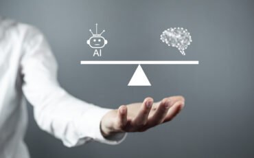 Man showing human brain with a Ai robot on scales.